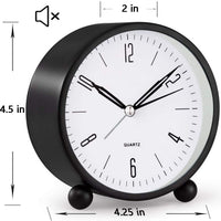 Compact Alarm Clock with Silent Second Hand and Yellow Night Light
