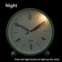 Compact Alarm Clock with Silent Second Hand and Yellow Night Light