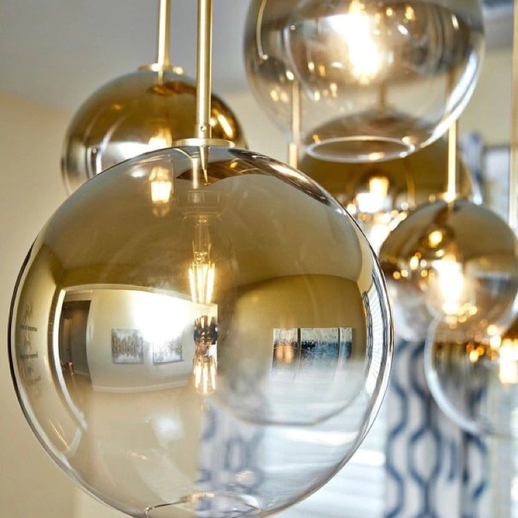 Modern Glass Globe Pendant Light in Brass Design