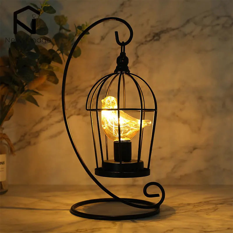 Warm White Fairy Light Table Lamp with Metal Birdcage Frame and Bird Accent