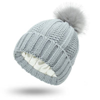 Antistatic Pompom Beanie with Silk Lining for Frizz-Free Hair