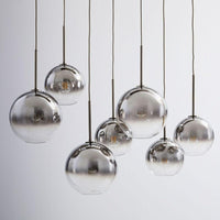 Modern Glass Globe Pendant Light in Brass Design
