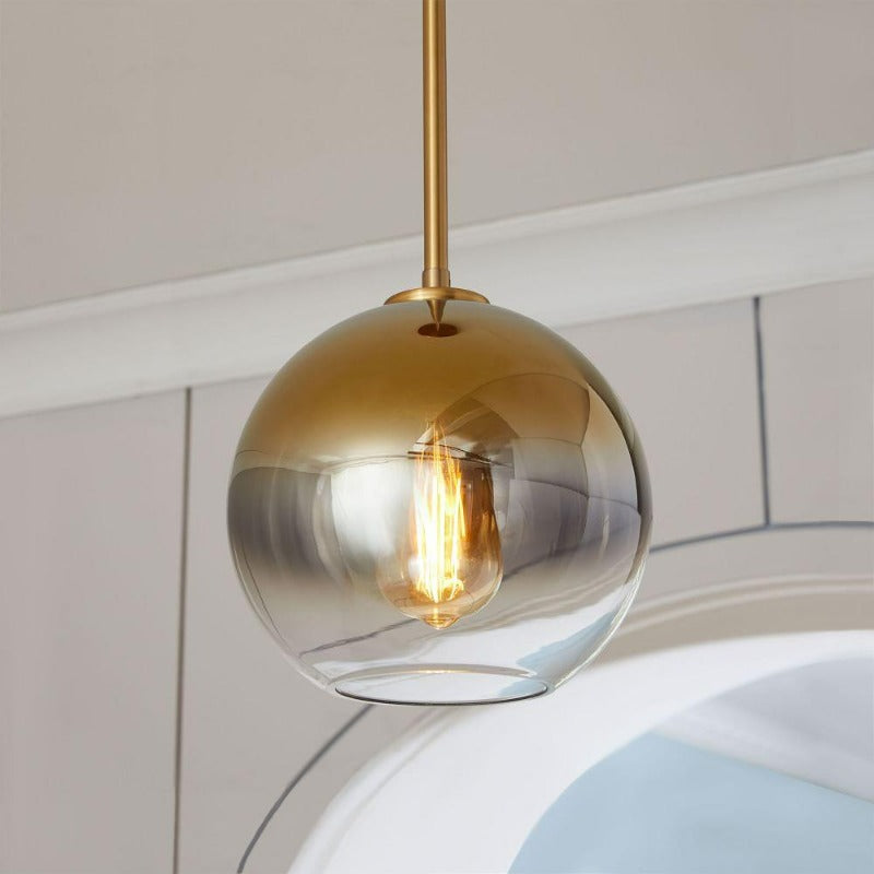 Modern Glass Globe Pendant Light in Brass Design